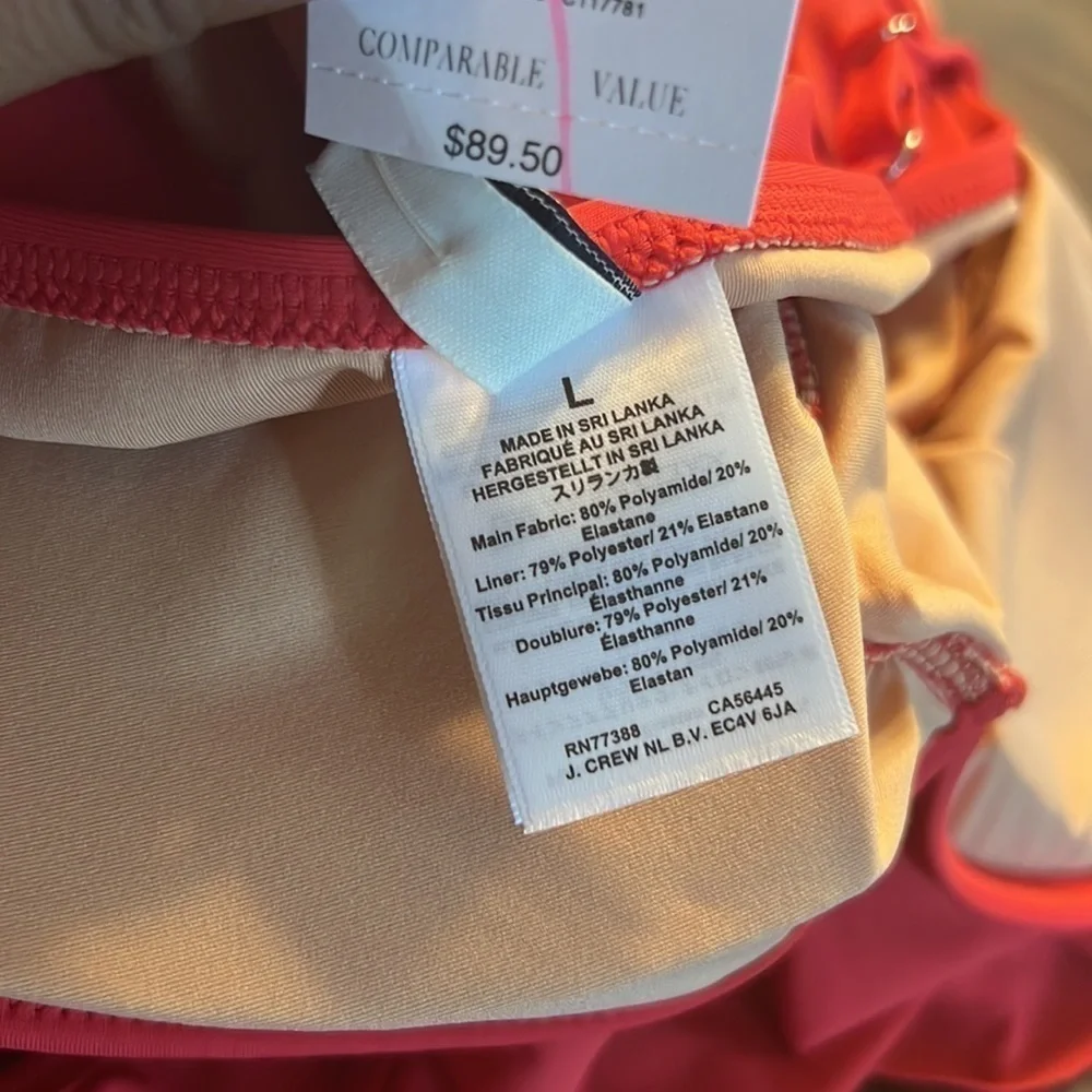 - J crew Ruffle-shoulder V-neck one-piece swimsuit.